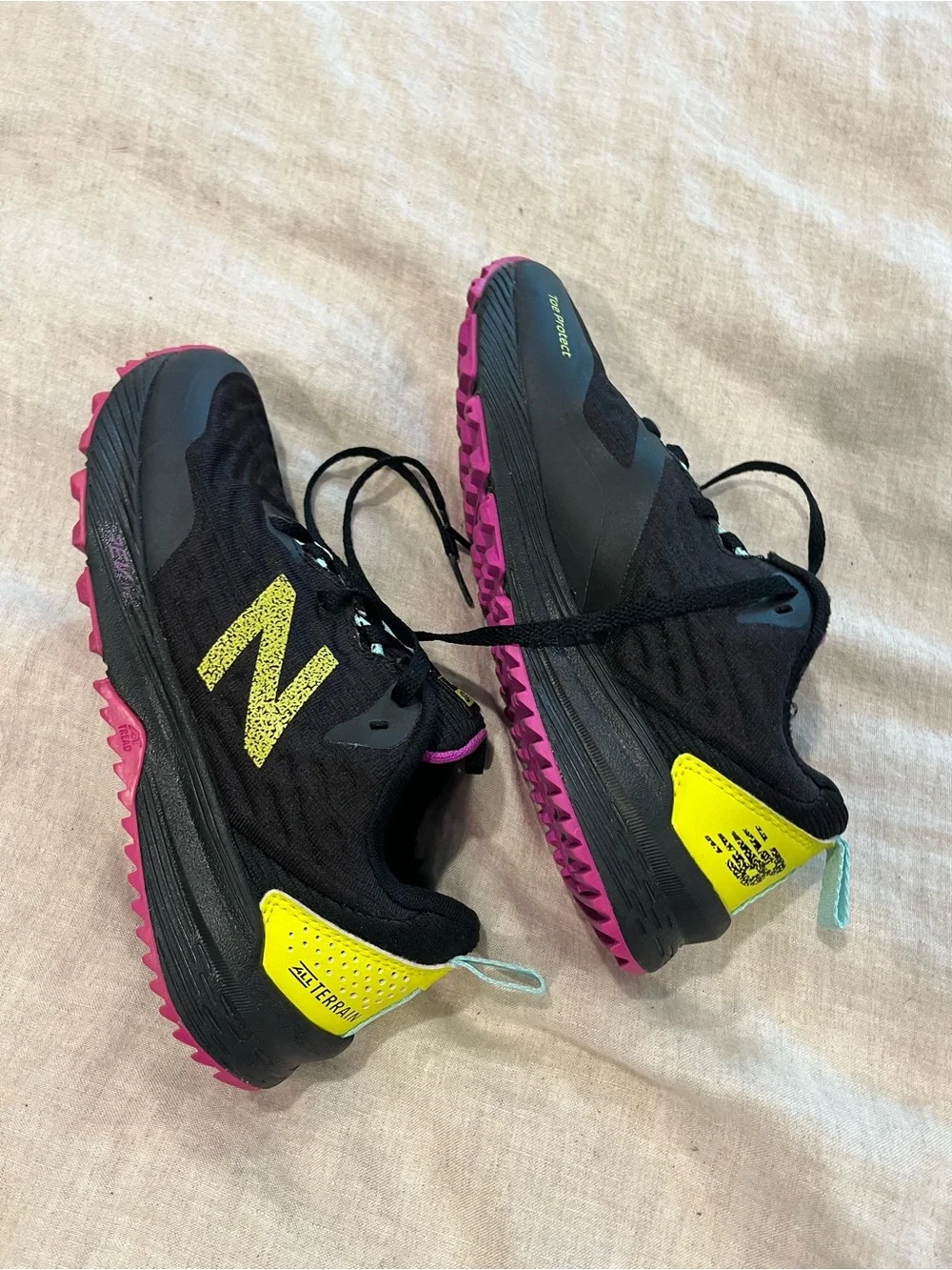 New Balance Women's Black Shoes with Yellow Heel and Pink Outsole